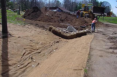 Protective blankets hold soil in place and help establish ground cover.